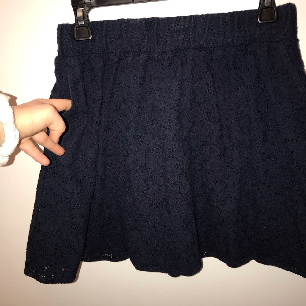 Navy blue textured mini skirt